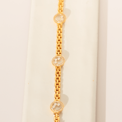 Chopard Happy Diamonds - Bracelet en or jaune et diamants 58 Facettes 3282