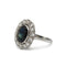 54 Bague marguerite en or blanc, diamants et saphir 58 Facettes SA029