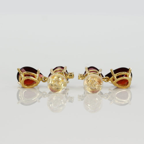 Boucles d'oreilles Parure boucles d’oreilles et pendentif en or jaune, grenats et diamants 58 Facettes S002