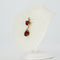 Boucles d'oreilles Parure boucles d’oreilles et pendentif en or jaune, grenats et diamants 58 Facettes S002