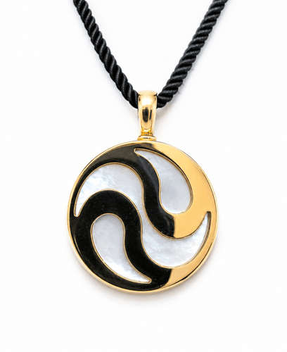 BVLGARI Yang - Pendentif tournant en or jaune 18 carats 58 Facettes Bb