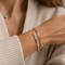 Bracelet jonc en or rosé et diamants baguette 58 Facettes 1.0001604/3
