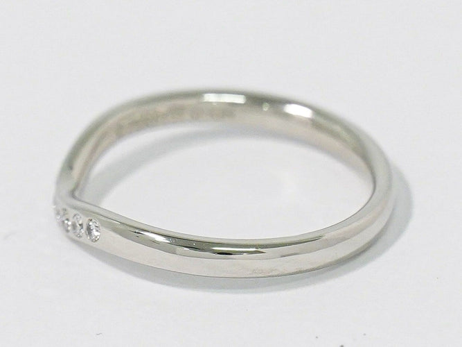 Bague 47 Tiffany & Co. Elsa Peretti - Alliance courbée en platine et diamants 58 Facettes p6tehryi1y