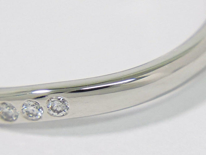 Bague 47 Tiffany & Co. Elsa Peretti - Alliance courbée en platine et diamants 58 Facettes p6tehryi1y