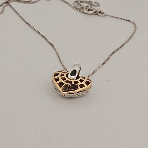 Collier cœur en or jaune et blanc avec brillants 58 Facettes 2909737