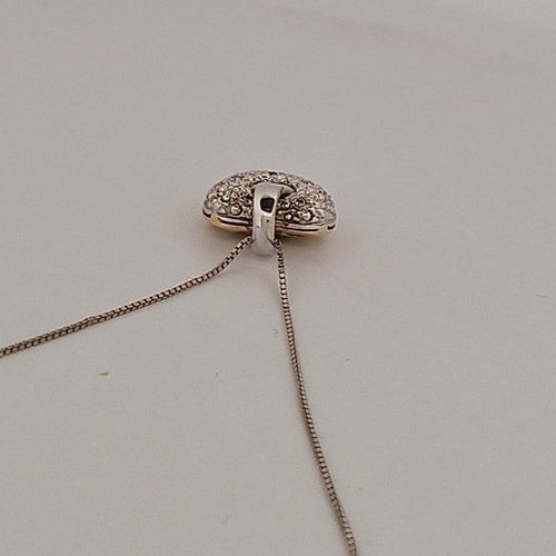 Collier cœur en or jaune et blanc avec brillants 58 Facettes 2909737