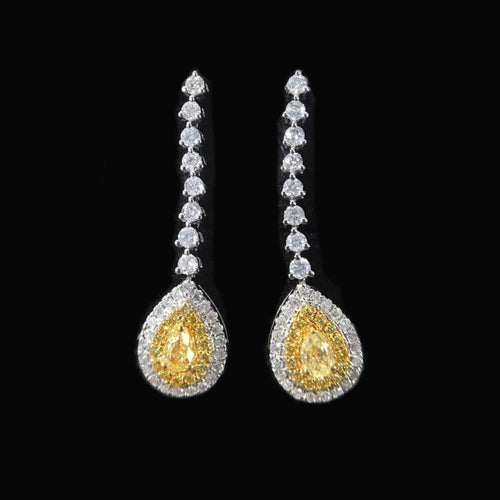Boucles d'oreilles poire en or blanc 18K et diamants jaunes 58 Facettes GER1344WG