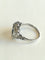 55 Bague Art déco en or blanc, saphir et diamants 58 Facettes 01181