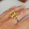 56.5 Bague cocktail vintage en or rose 18 carats et citrine 58 Facettes 681