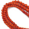 Collier trois rangs en corail avec fermoir en or jaune 18 kt 58 Facettes 221/26 H 114/26