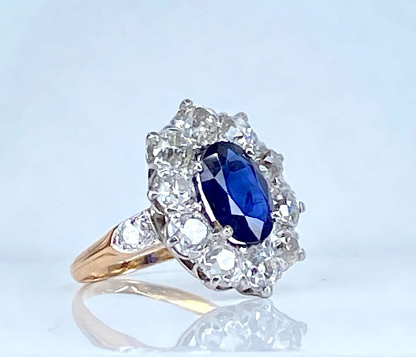 50 Bague marguerite en or 18 carats, saphir et diamants 58 Facettes AB735