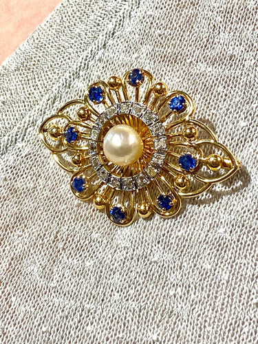 Broche en or jaune avec saphirs, diamants et perle 58 Facettes AB736