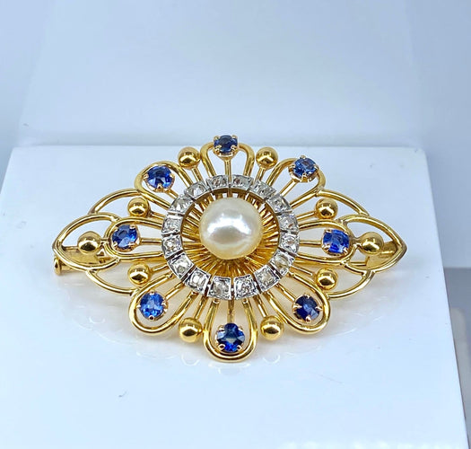 Broche en or jaune avec saphirs, diamants et perle 58 Facettes AB736