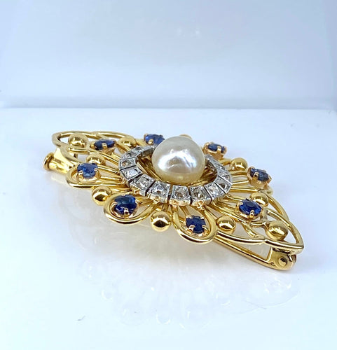 Broche en or jaune avec saphirs, diamants et perle 58 Facettes AB736