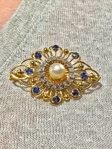 Broche en or jaune avec saphirs, diamants et perle 58 Facettes AB736