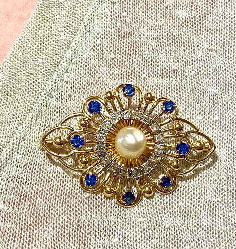 Broche en or jaune avec saphirs, diamants et perle 58 Facettes AB736
