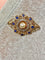Broche en or jaune avec saphirs, diamants et perle 58 Facettes AB736