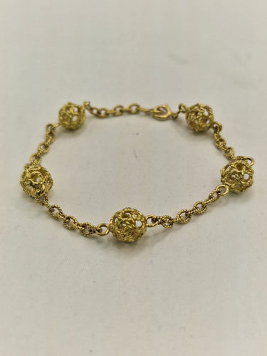 Bracelet motif nœud vintage en or jaune 18 ct 58 Facettes CV-092