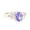 57 Bague entourage en or blanc 18K avec tanzanite et diamants 58 Facettes 3230-3
