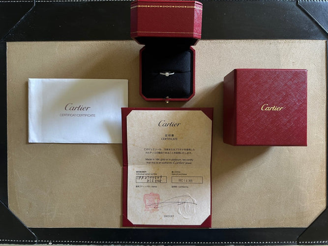 49 Cartier Étincelle - Bague solitaire en platine et diamants 58 Facettes Cartier 0.31