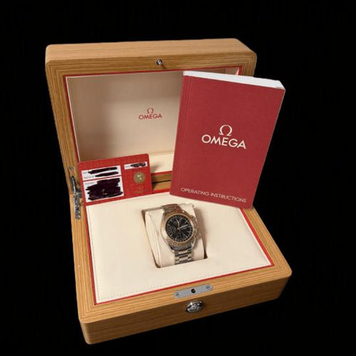 Omega Speedmaster - Montre Day Date automatique en or rose et acier 58 Facettes MT47400