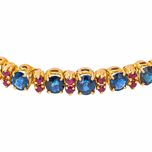 Bracelet en or rose et jaune avec saphirs et rubis 58 Facettes 4776474CN
