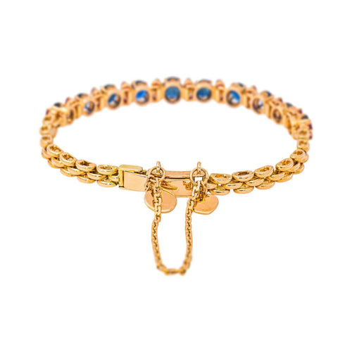 Bracelet en or rose et jaune avec saphirs et rubis 58 Facettes 4776474CN