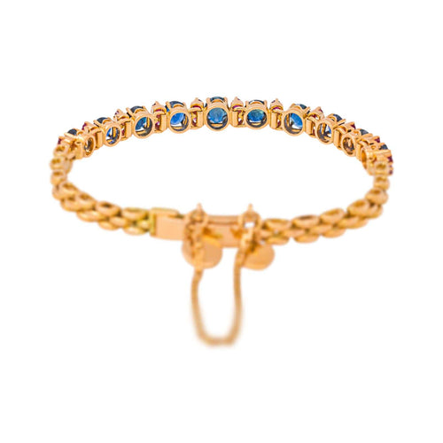 Bracelet en or rose et jaune avec saphirs et rubis 58 Facettes 4776474CN