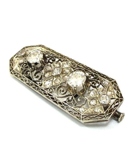 Broche en or blanc 18 ct et diamants 58 Facettes 773 F OC