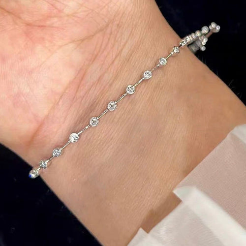 Embrace - Bracelet tennis en or blanc et diamants 58 Facettes GBT1040WG