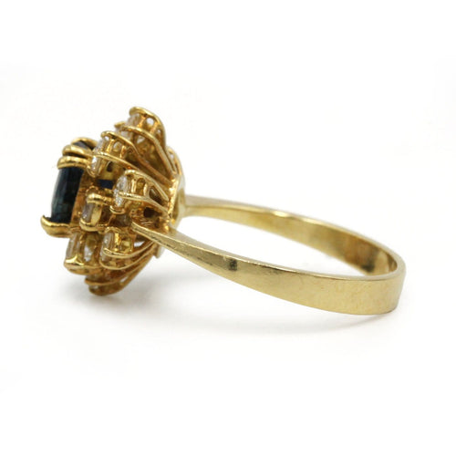 55 Bague marguerite en or jaune, saphir et diamants 58 Facettes 260041SP