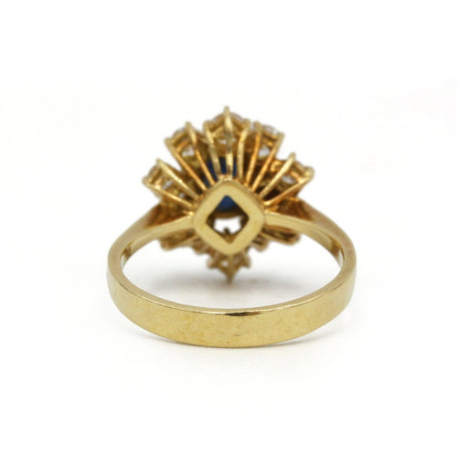 55 Bague marguerite en or jaune, saphir et diamants 58 Facettes 260041SP