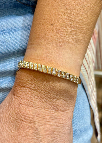 Bracelet jonc ouvrant en or jaune 18 carats et diamants 58 Facettes 90939