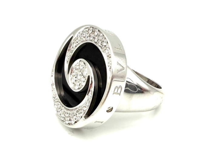 52 Bvlgari Optical - Bague en or blanc, acier, onyx et diamants 58 Facettes BVLGARI BG