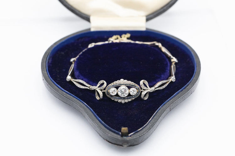 Bracelet ancien en or et platine, diamants et saphirs synthétiques 58 Facettes 13497