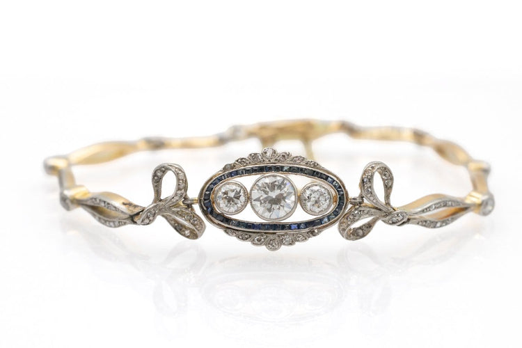 Bracelet ancien en or et platine, diamants et saphirs synthétiques 58 Facettes 13497