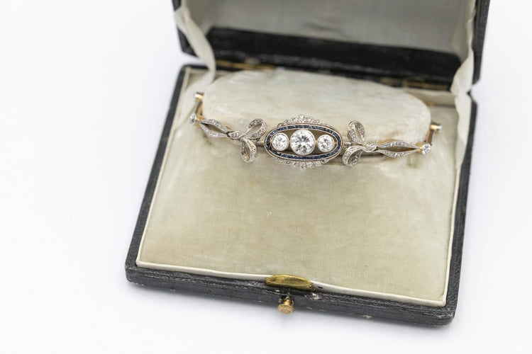 Bracelet ancien en or et platine, diamants et saphirs synthétiques 58 Facettes 13497