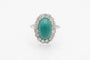 55 Bague ovale en platine avec turquoise et diamants 58 Facettes 12386A