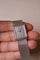 Piaget Tank - Montre extra-plate en or blanc Clous de Paris 58 Facettes MONTRE-013