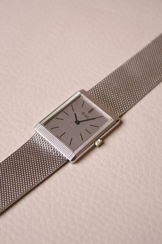 Piaget Tank - Montre extra-plate en or blanc Clous de Paris 58 Facettes MONTRE-013