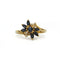 55 Bague florale en or jaune, saphirs et diamants 58 Facettes 260185R