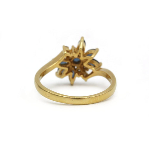 55 Bague florale en or jaune, saphirs et diamants 58 Facettes 260185R