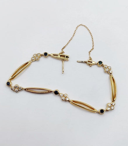 Bracelet vintage en or 18k, diamants et saphirs 58 Facettes A07641