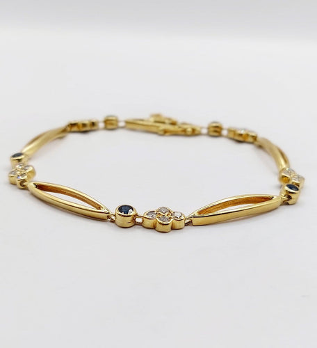 Bracelet vintage en or 18k, diamants et saphirs 58 Facettes A07641