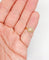 46 Bague marguerite antique en or rose 18K, perle et diamants 58 Facettes A07642