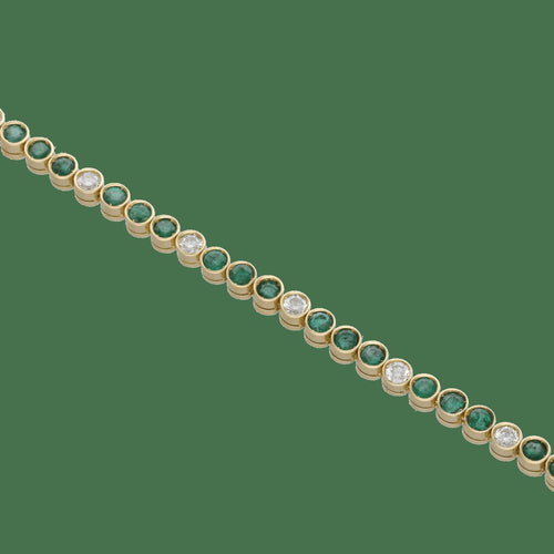 bracelet-emeraudes-3-cts-et-diamants-110-ct-h-vs-en-or-jaune-18k-18-cm.jpg