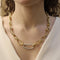 Pomellato Paisley - Collier en or jaune, or gris et diamants 58 Facettes FB11636