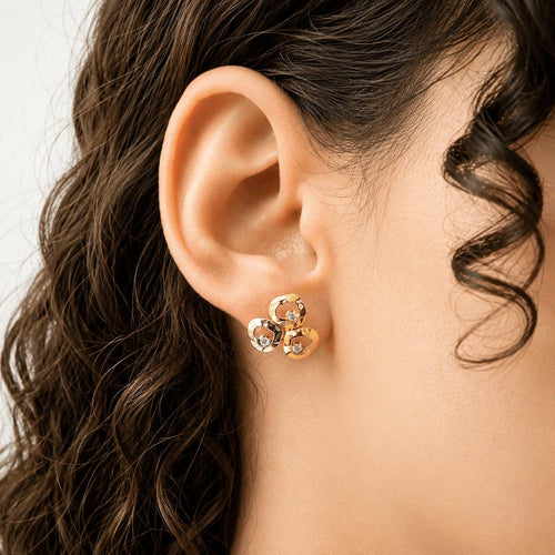 boucles-doreilles-chopard-happy-curve-trois-ors-18k-diamants-015-ct-vers-2005.jpg