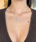Collier Collier double cercle pavé de diamants en or gris 18 carats 58 Facettes C83