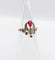 42 Bague duchesse antique en or rose 18k, pierre rouge et diamants 58 Facettes A07649